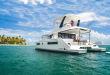 Stern view of power catamaran in blue water