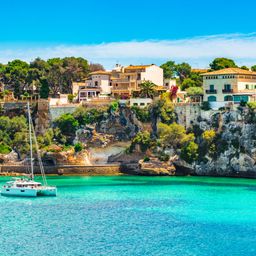 Catamaran in a picturesque bay of Mallorca