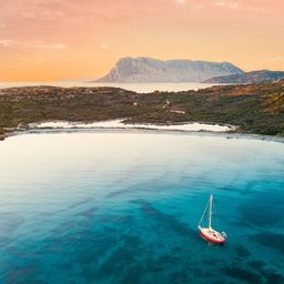 Sailboat anchored off Sardinia