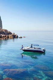 Speed boat on calm blue sea